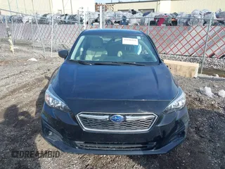 2017 Subaru Impreza with VIN 4S3GTAA60H3746716, listed as a IAAI auction lot 41846153 with 76,704 mi miles. Bid and sale history available at carsss.com. Image 12.