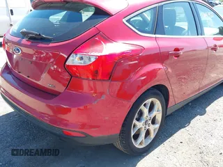 2012 Ford Focus SEL with VIN 1FAHP3M22CL335913, listed as a IAAI auction lot 42143922 with 129,421 mi miles. Bid and sale history available at carsss.com. Image 6.