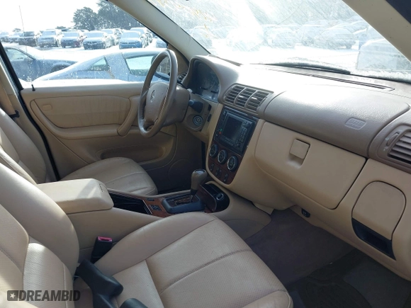2003 Mercedes-Benz M-Class 3.7L with VIN 4JGAB57E33A421704, listed as a IAAI auction lot 41404597 with 192,078 mi miles. Bid and sale history available at carsss.com. Image 5.