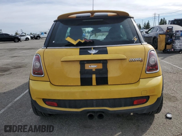 2009 MINI Hardtop S with VIN WMWMF73599TW87679, listed as a Copart auction lot 46863725 with 102,976 mi miles and Salvage title. Bid and sale history available at DreamBid. Image 6.