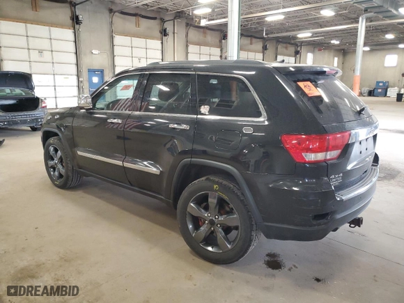 2013 Jeep Grand Cherokee Limited with VIN 1C4RJFBT2DC595596, listed as a Copart auction lot 51112815 with 260,184 mi miles and Salvage Title. Bid and sale history available at carsss.com. Image 2.