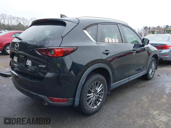 2017 Mazda CX-5 Sport with VIN JM3KFABL6H0213672, listed as a IAAI auction lot 41721128 with 100,266 mi miles. Bid and sale history available at carsss.com. Image 4.