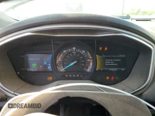 2016 Ford Fusion SE Hybrid with VIN 3FA6P0LUXGR131599, listed as a Copart auction lot 54498685 with 160,379 mi miles and Salvage title. Bid and sale history available at DreamBid. Image 9.