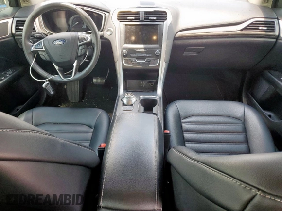 2020 Ford Fusion SEL z VIN 3FA6P0CD5LR168103, wystawiony jako Copart lot #62559935 z przebiegiem 60 240 mil mil oraz Szkoda całkowita • Salvage title. Historia ofert i sprzedaży dostępna na DreamBid. Obrazek 8.