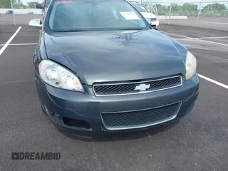 2013 Chevrolet Impala LTZ with VIN 2G1WC5E36D1187393, listed as a IAAI auction lot 42123859 with 176,539 mi miles and . Bid and sale history available at DreamBid. Image 6.