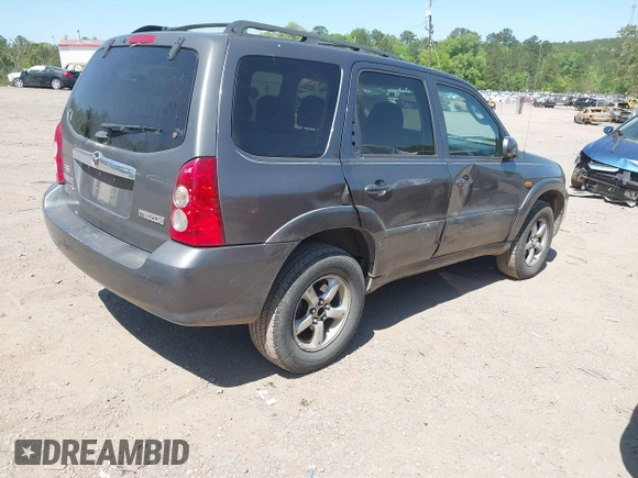 2005 Mazda Tribute S with VIN 4F2YZ04125KM04568, listed as a IAAI auction lot 41973671 with 244,117 mi miles and . Bid and sale history available at carsss.com. Image 4.