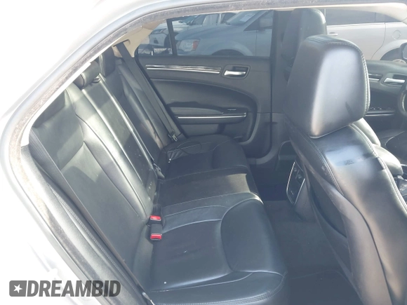 2016 Chrysler 300 Anniversary Edition with VIN 2C3CCAAG9GH211875, listed as a IAAI auction lot 42052083 with 209,251 mi miles and . Bid and sale history available at DreamBid. Image 8.