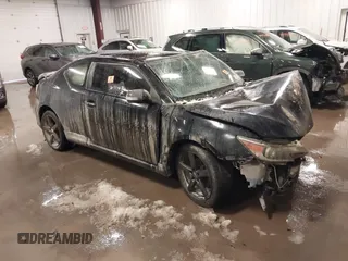 2014 Scion tC z VIN JTKJF5C78E3079814, wystawiony jako IAAI lot #41559606 z przebiegiem 144 887 mil mil oraz . Historia ofert i sprzedaży dostępna na DreamBid. Obrazek 1.