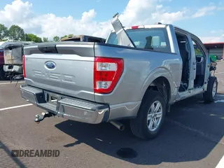 2021 Ford F-150 XL z VIN 1FTEW1CB8MKE90821, wystawiony jako IAAI lot #42733214 z przebiegiem 74 371 mil mil oraz . Historia ofert i sprzedaży dostępna na DreamBid. Obrazek 4.