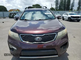 2012 Kia Sorento SX with VIN 5XYKW4A29CG308152, listed as a Copart auction lot 64895355 with 126,816 mi miles and Salvage title. Bid and sale history available at DreamBid. Image 5.