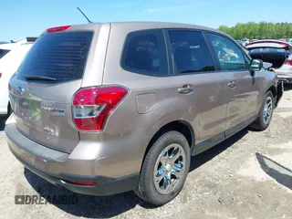 2014 Subaru Forester 2.5i with VIN JF2SJAAC4EH516103, listed as a IAAI auction lot 42065064 with 140,531 mi miles and . Bid and sale history available at DreamBid. Image 4.