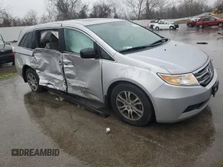 2013 Honda Odyssey EX-L with VIN 5FNRL5H63DB001333, listed as a Copart auction lot 47745635 with 169,539 mi miles and Salvage Title. Bid and sale history available at DreamBid. Image 4.