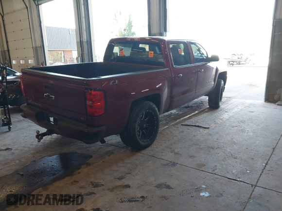 2018 Chevrolet Silverado 1500 LT with VIN 3GCUKREC0JG580317, listed as a IAAI auction lot 41868522 with 75,738 mi miles. Bid and sale history available at carsss.com. Image 4.