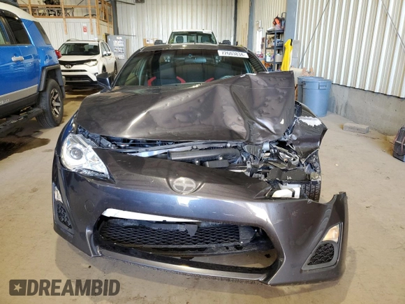 2014 Scion FR-S z VIN JF1ZNAA11E9701435, wystawiony jako Copart lot #72603834 z przebiegiem 127 940 mil mil oraz Szkoda całkowita • Salvage title. Historia ofert i sprzedaży dostępna na DreamBid. Obrazek 5.
