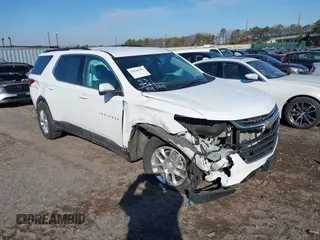 2021 Chevrolet Traverse LT Leather with VIN 1GNEVHKWXMJ125215, listed as a IAAI auction lot 41641782 with 53,598 mi miles. Bid and sale history available at carsss.com. Image 1.