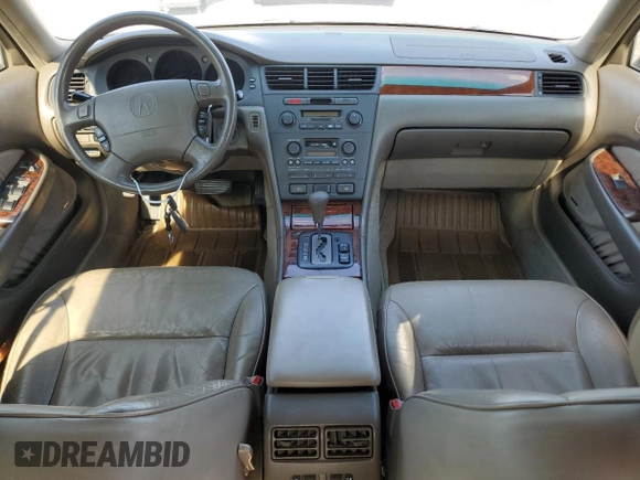 1996 Acura RL with VIN JH4KA965XTC009917, listed as a Copart auction lot 65083665 with 197,486 mi miles and Salvage title. Bid and sale history available at DreamBid. Image 8.