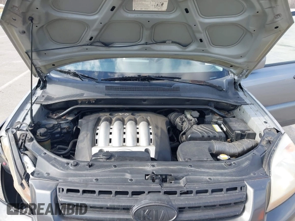 2005 Kia Sportage LX with VIN KNDJE723757102304, listed as a IAAI auction lot 41689073 with 125,276 mi miles and . Bid and sale history available at carsss.com. Image 10.