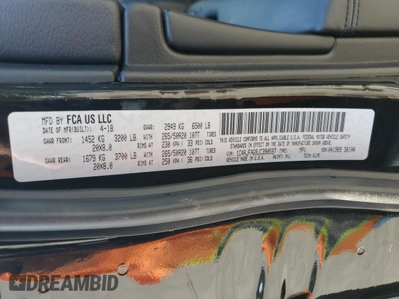 2018 Jeep Grand Cherokee Laredo E with VIN 1C4RJFAG9JC390597, listed as a Copart auction lot 71450474 with 69,645 mi miles and Salvage title. Bid and sale history available at DreamBid. Image 14.