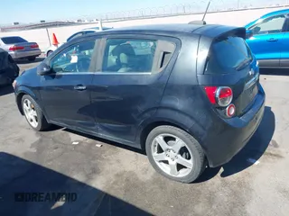 2015 Chevrolet Sonic LTZ with VIN 1G1JE6SB8F4116693, listed as a IAAI auction lot 42865997 with 102,961 mi miles and . Bid and sale history available at DreamBid. Image 3.