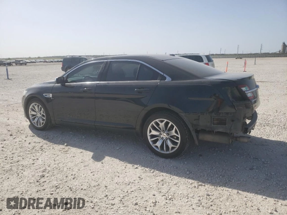2015 Ford Taurus Limited with VIN 1FAHP2F83FG106102, listed as a Copart auction lot 49819005 with 100,925 mi miles and Salvage Title. Bid and sale history available at DreamBid. Image 2.