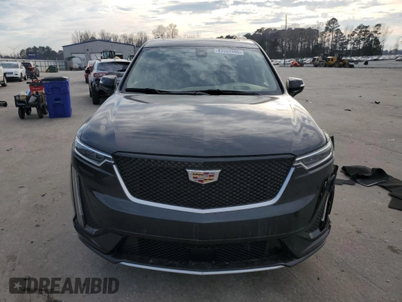 2023 Cadillac XT6 AWD Sport with VIN 1GYKPHRS3PZ150630, listed as a Copart auction lot 43557595 with 54,299 mi miles and Salvage title. Bid and sale history available at DreamBid. Image 5.