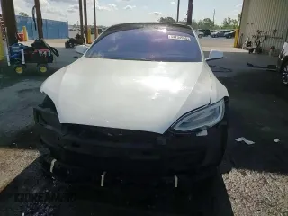 2017 Tesla Model S 100D z VIN 5YJSA1E21HF229936, wystawiony jako Copart lot #54734955 z przebiegiem 125 511 mil mil oraz Szkoda całkowita • Salvage title. Historia ofert i sprzedaży dostępna na DreamBid. Obrazek 14.