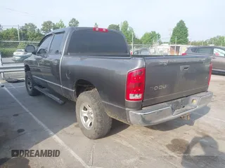 2004 Dodge 1500 SLT with VIN 1D7HU18N14J107934, listed as a IAAI auction lot 42099925 with 237,021 mi miles. Bid and sale history available at carsss.com. Image 3.