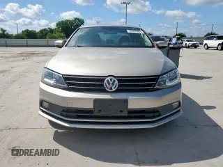 2015 Volkswagen Jetta SE z VIN 3VWD07AJ6FM252596, wystawiony jako Copart lot #62223885 z przebiegiem 140 885 mil mil oraz Czysty tytuł • Clean title. Historia ofert i sprzedaży dostępna na DreamBid. Obrazek 5.