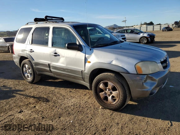 2001 Mazda Tribute LX with VIN 4F2CU08111KM20113, listed as a Copart auction lot 87681195 with 144,400 mi miles and Salvage Title. Bid and sale history available at DreamBid. Image 4.