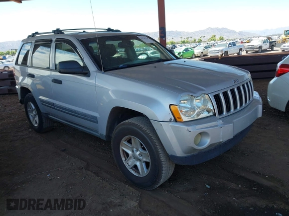 2005 Jeep Grand Cherokee Laredo z VIN 1J4HS48N65C563266, wystawiony jako IAAI lot #42784524 z przebiegiem 156 702 mil mil oraz . Historia ofert i sprzedaży dostępna na DreamBid. Obrazek 1.