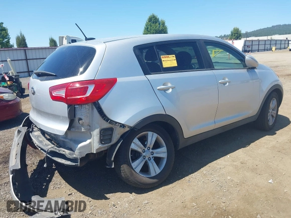 2013 Kia Sportage LX with VIN KNDPBCA24D7352828, listed as a IAAI auction lot 42685744 with 156,805 mi miles and . Bid and sale history available at DreamBid. Image 4.