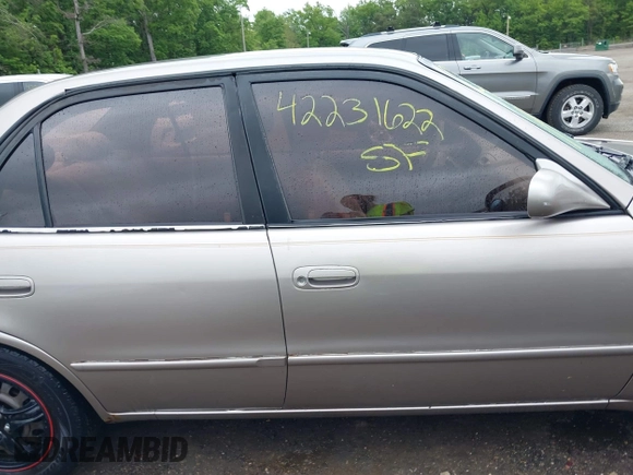 1999 Toyota Corolla VE with VIN 2T1BR12E9XC204275, listed as a IAAI auction lot 42231622 with 180,732 mi miles and . Bid and sale history available at DreamBid. Image 13.