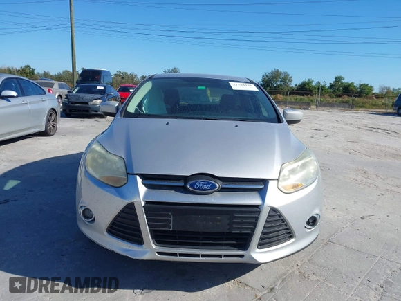 2012 Ford Focus SE with VIN 1FAHP3F23CL265724, listed as a IAAI auction lot 41184121 with 216,873 mi miles. Bid and sale history available at carsss.com. Image 12.