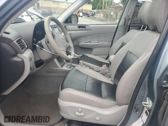 2010 Subaru Forester X Premium with VIN JF2SH6CC4AH753576, listed as a Copart auction lot 65117875 with 94,102 mi miles and Salvage title. Bid and sale history available at DreamBid. Image 7.