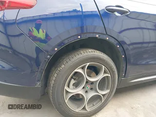 2019 Alfa Romeo Stelvio z VIN ZASPAKAN0K7C44623, wystawiony jako IAAI lot #42062414 z przebiegiem 68 722 mil mil oraz . Historia ofert i sprzedaży dostępna na DreamBid. Obrazek 18.
