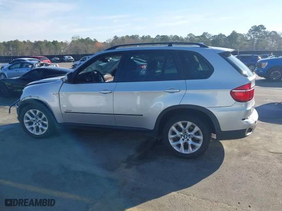2011 BMW X5 35i with VIN 5UXZV4C5XBL412661, listed as a IAAI auction lot 41810470 with 168,470 mi miles. Bid and sale history available at carsss.com. Image 13.
