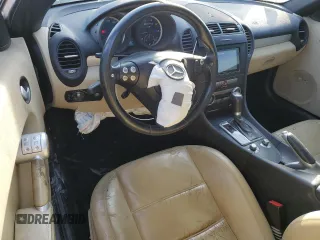 2006 Mercedes-Benz SLK-Class 5.5L AMG with VIN WDBWK73F06F100763, listed as a Copart auction lot 86308114 with 147,759 mi miles and Salvage Title. Bid and sale history available at carsss.com. Image 8.