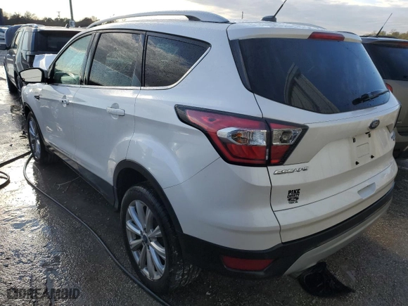 2017 Ford Escape Titanium with VIN 1FMCU0JD9HUB48912, listed as a Copart auction lot 84016554 with 52,199 mi miles and Salvage Title. Bid and sale history available at carsss.com. Image 2.