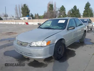 2001 Toyota Camry CE with VIN 4T1BG22KX1U867930, listed as a IAAI auction lot 41764995 with 216,679 mi miles. Bid and sale history available at carsss.com. Image 2.
