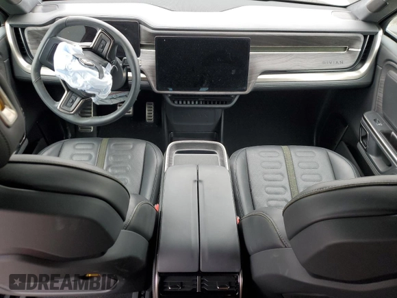 2022 Rivian R1T Adventure z VIN 7FCTGAAA5NN015734, wystawiony jako Copart lot #44019715 z przebiegiem 27 542 mil mil oraz Szkody całkowita. Historia ofert i sprzedaży dostępna na DreamBid. Obrazek 8.
