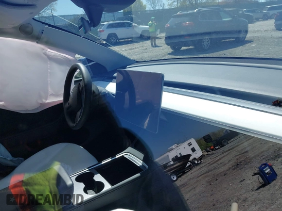 2023 Tesla Model Y Performance z VIN 7SAYGDEF4PF844933, wystawiony jako IAAI lot #42048999 z przebiegiem Nie podano mil oraz . Historia ofert i sprzedaży dostępna na DreamBid. Obrazek 7.