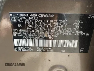 2014 Toyota RAV4 LE with VIN JTMZFREVXED034316, listed as a IAAI auction lot 42610135 with 214,871 mi miles and . Bid and sale history available at DreamBid. Image 9.