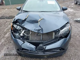 2019 Toyota Corolla L z VIN 2T1BURHE0KC167730, wystawiony jako IAAI lot #42335994 z przebiegiem 89 251 mil mil oraz . Historia ofert i sprzedaży dostępna na DreamBid. Obrazek 6.