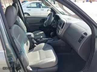 2007 Ford Escape Hybrid with VIN 1FMCU59H37KA92464, listed as a IAAI auction lot 42001479 with 159,147 mi miles. Bid and sale history available at carsss.com. Image 5.