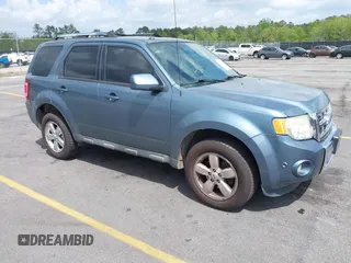 2011 Ford Escape Limited with VIN 1FMCU0E78BKB28559, listed as a IAAI auction lot 41951972 with 213,913 mi miles. Bid and sale history available at carsss.com. Image 1.