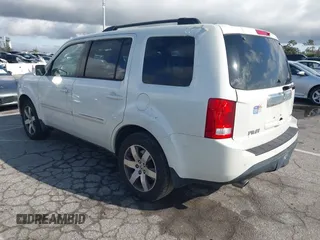 2015 Honda Pilot Touring with VIN 5FNYF3H93FB007766, listed as a IAAI auction lot 41932052 with 131,036 mi miles. Bid and sale history available at carsss.com. Image 3.