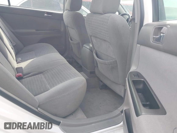 2005 Toyota Camry LE with VIN 4T1BF32K55U083752, listed as a IAAI auction lot 42145407 with 229,838 mi miles and . Bid and sale history available at DreamBid. Image 8.