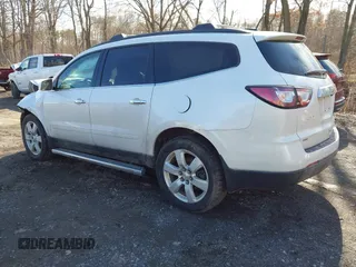2016 Chevrolet Traverse LT with VIN 1GNKVGKD6GJ146045, listed as a IAAI auction lot 41874364 with 99,486 mi miles and . Bid and sale history available at DreamBid. Image 3.