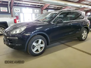 2012 Porsche Cayenne with VIN WP1AA2A25CLA00607, listed as a Copart auction lot 64816315 with 94,511 mi miles and Salvage title. Bid and sale history available at DreamBid. Image 1.