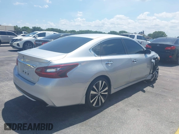 2017 Nissan Altima SV with VIN 1N4AL3AP2HC164553, listed as a IAAI auction lot 42215405 with 117,736 mi miles and . Bid and sale history available at DreamBid. Image 4.